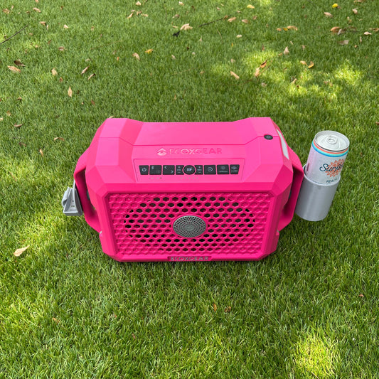 Slim can holder attachment from Ruckus Marine on a pink ECOXGEAR Defender speaker