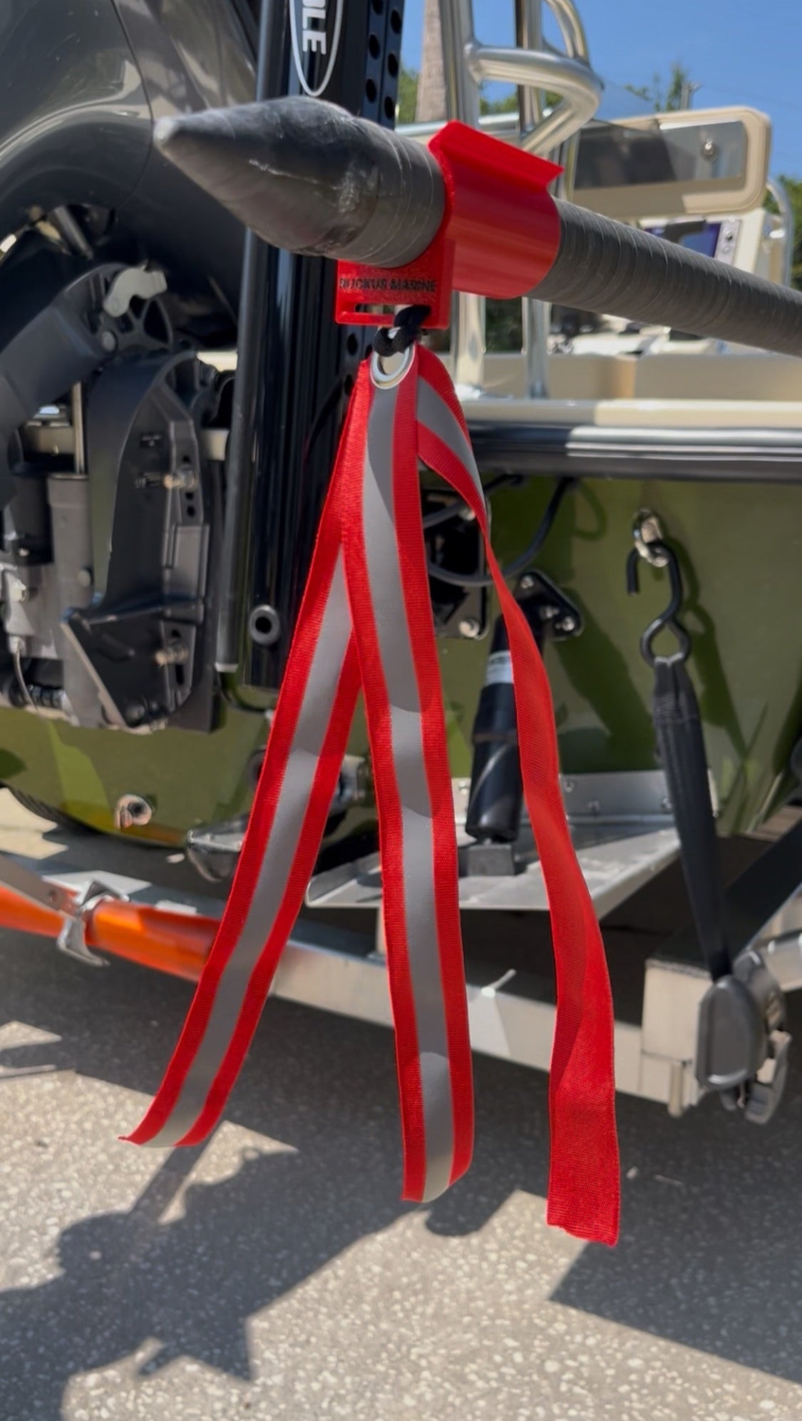Close-up of durable high-visibility safety flag on Ruckus Marine Push Pole Protector