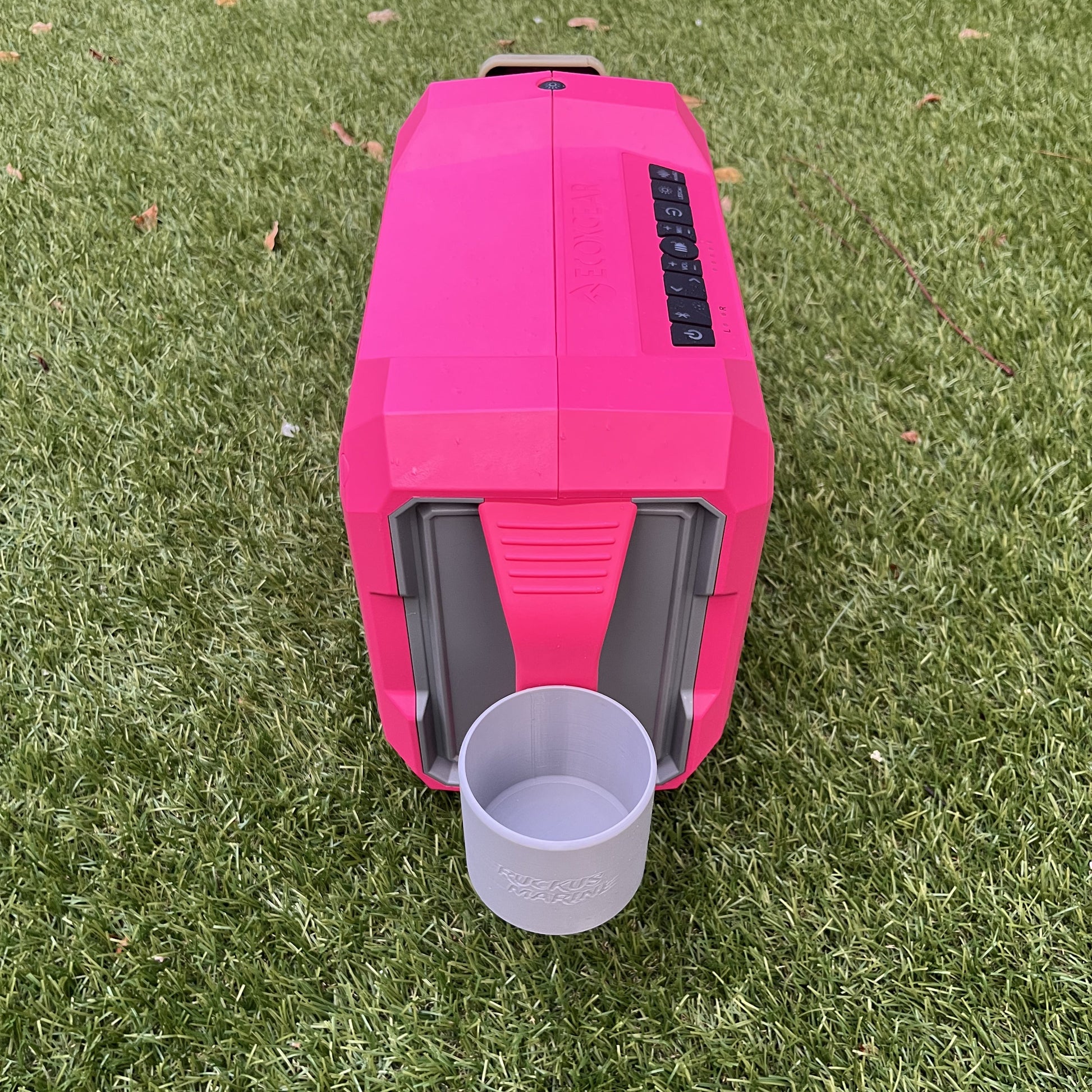 ECOXGEAR Defender speaker shown with a 12oz can holder attachment from Ruckus Marine