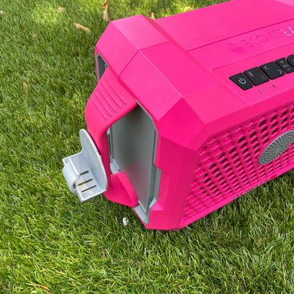 Isometric view of Ruckus Marine attachment for ECOXGEAR Defender Speaker. Zyn and dip can holder installed on side handle