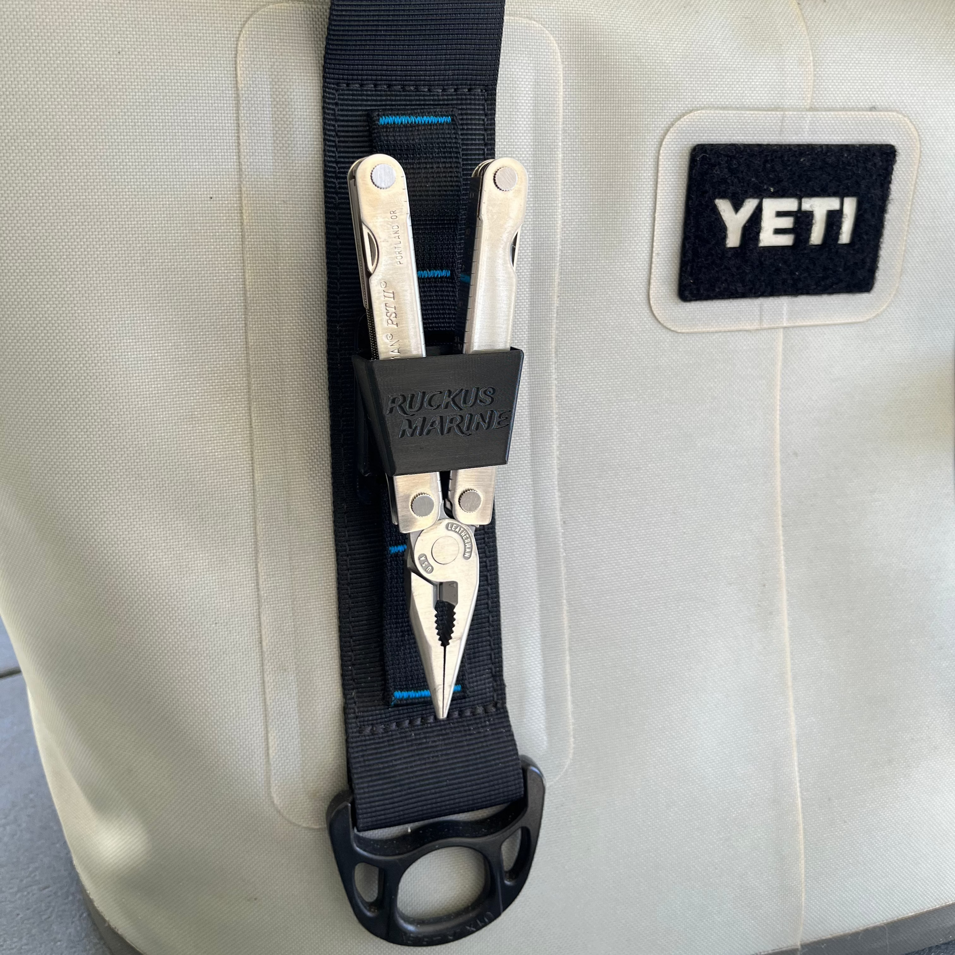 Ruckus Marine Pliers Holder in Black showing pliers installed