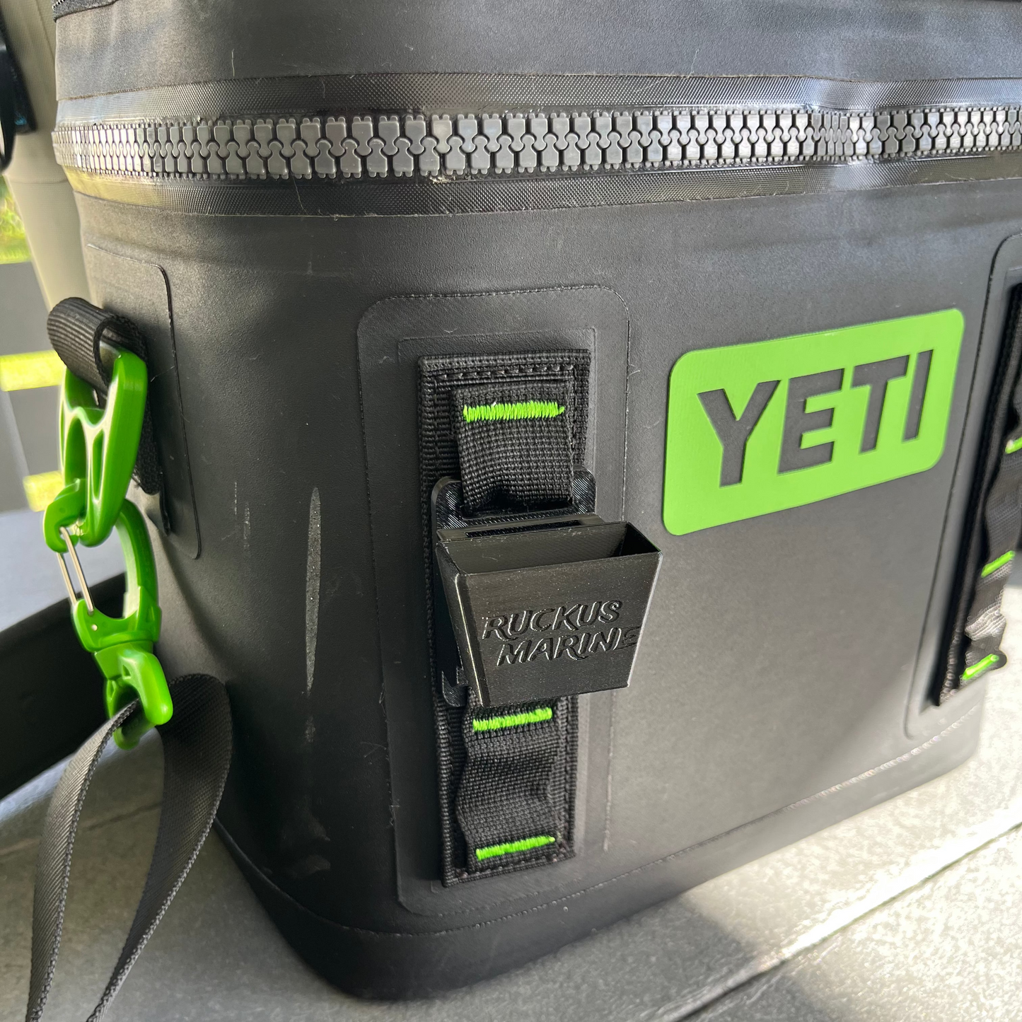 YETI cooler with a Ruckus Marine pliers holder attachment installed