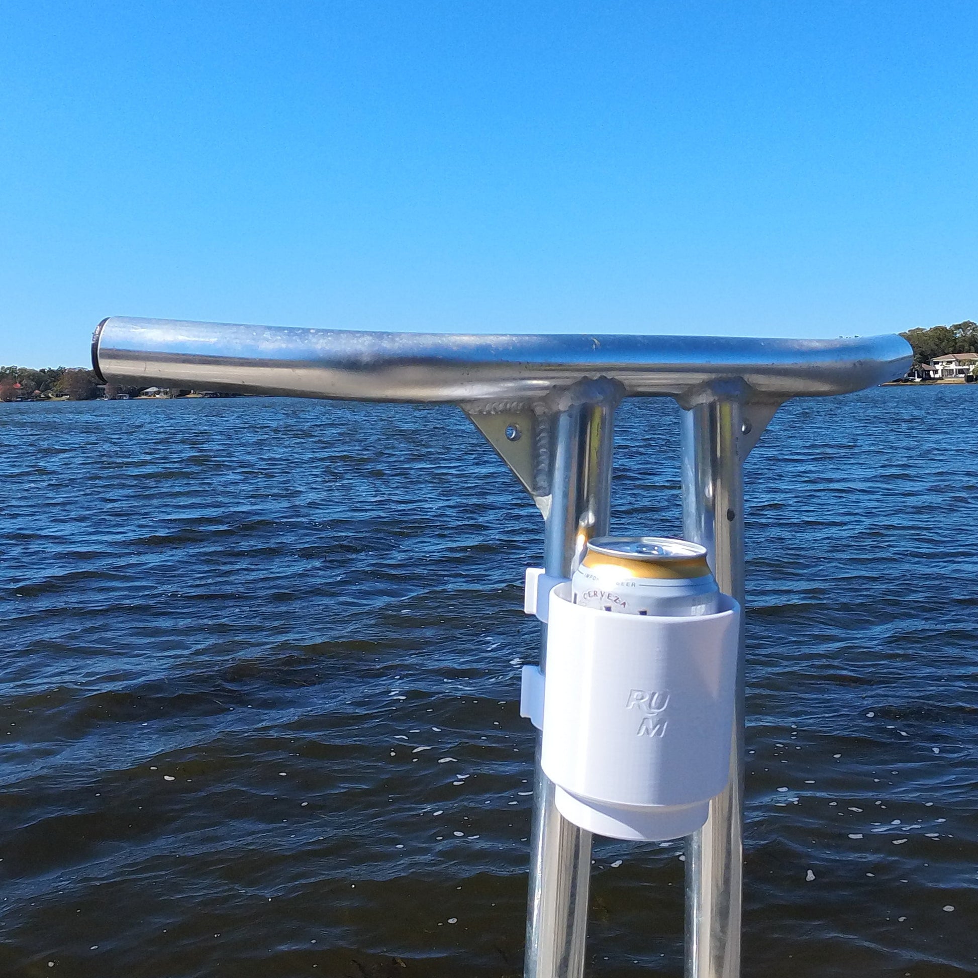 Sissy bar clip-on cup holder installed on skiff casting platform