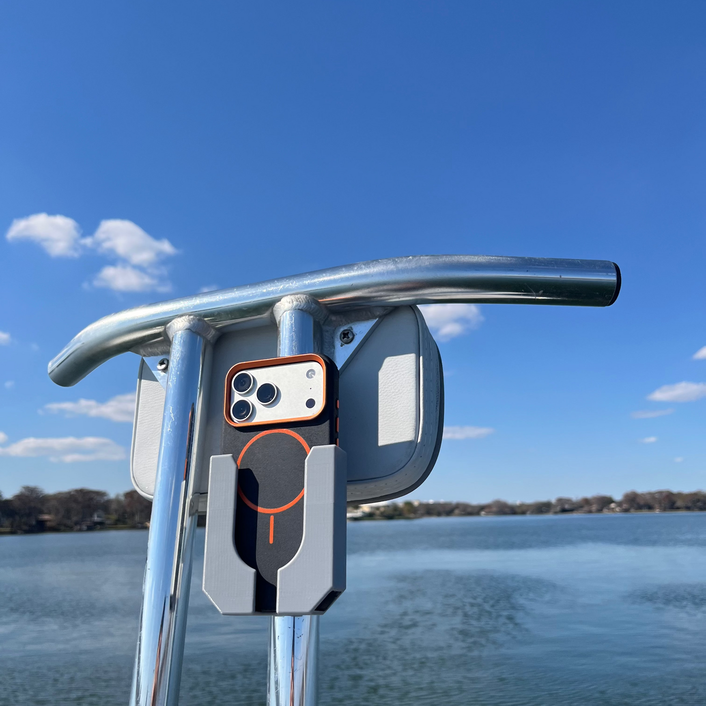 Phone Holder attachment for sissy bars on poling and casting platforms by Ruckus Marine shown in grey