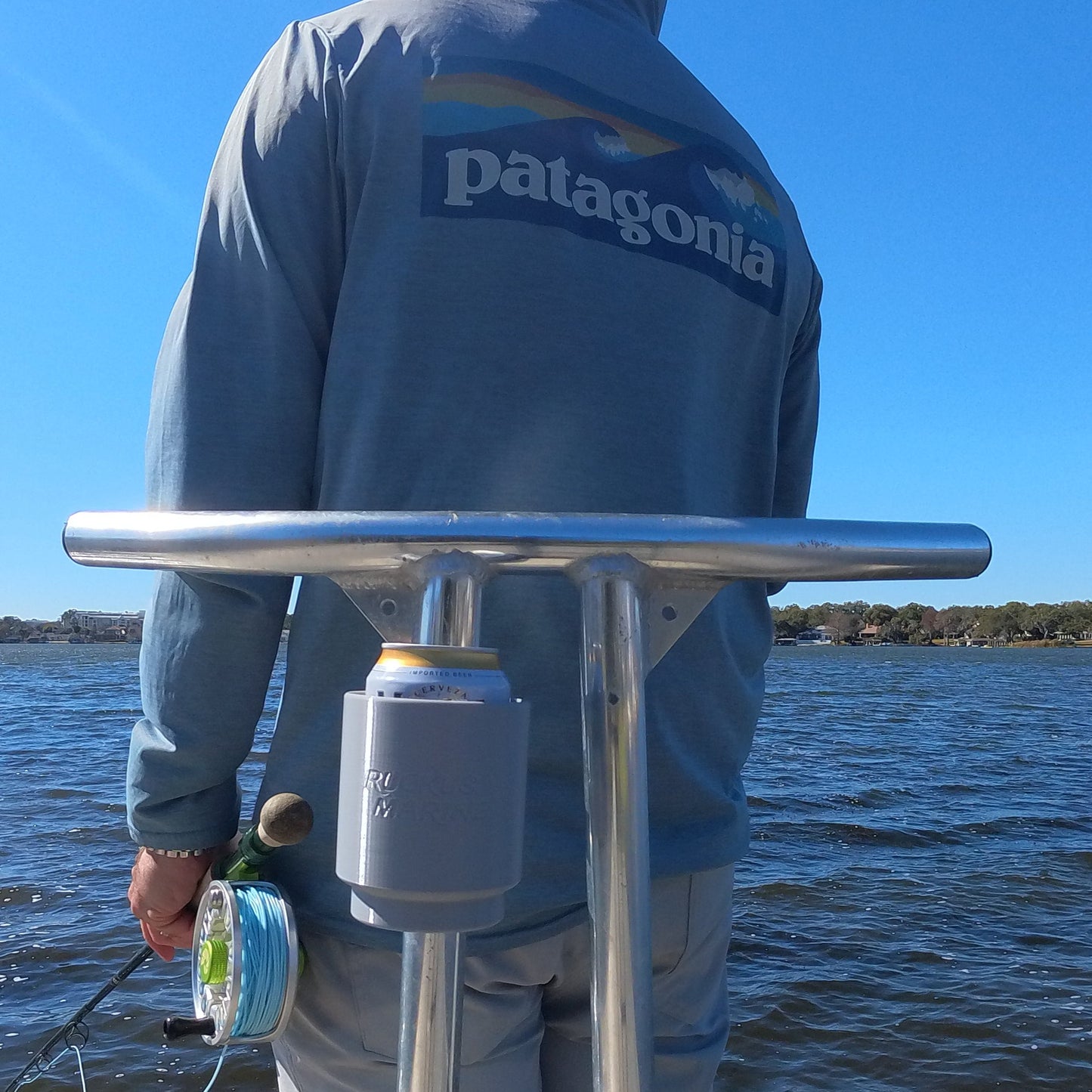 Clip-on cup holder on skiff poling platform built for saltwater fishing