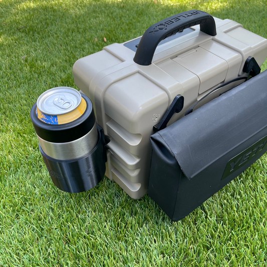 Yeti Sidekick attachment and Yeti Colster attachments for Turtlebox speaker shown in black.