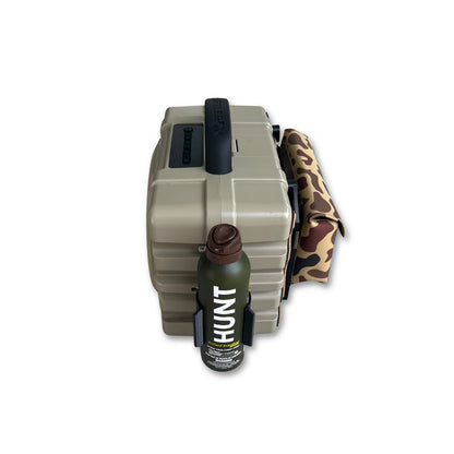Turtlebox bug spray holder from Ruckus Marine shown in black holding a HUNT repellent spray bottle